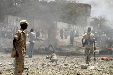 Somalia government soldiers secure the scene of a suicide attack in Somalia's capital Mogadishu