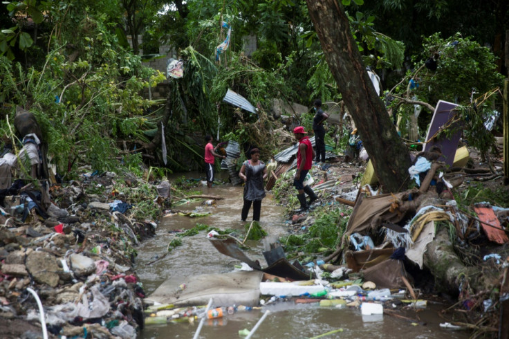 Locals try to save their belongings