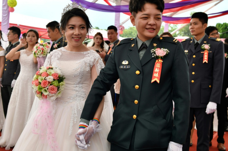 Gay couples tie knot at mass wedding