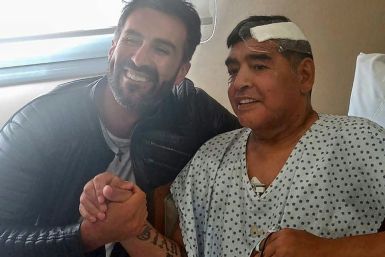 Maradona with his doctor after surgery