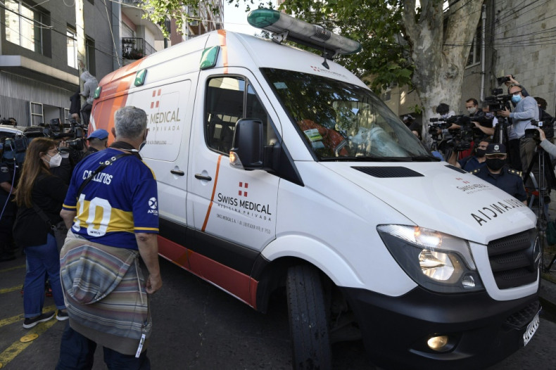 Ambulance carry Maradona leaves the clinic