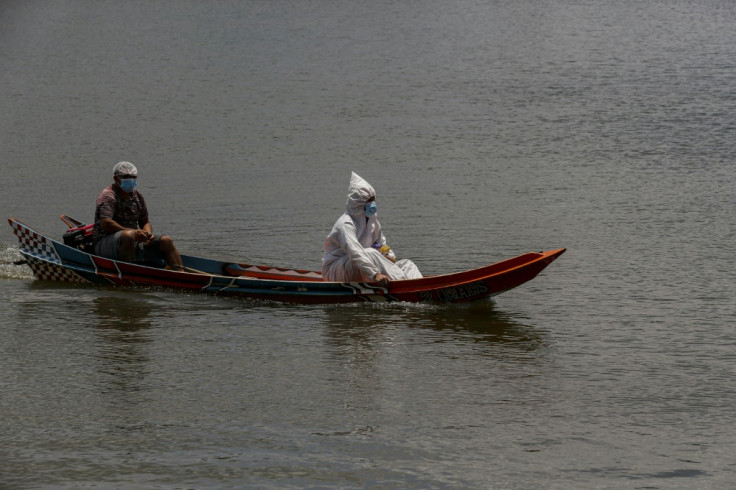 A Brazilian health worker visits remote areas