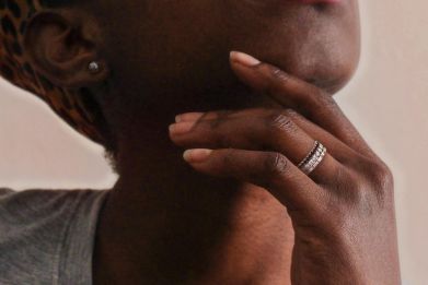 Women wearing a black diamond eternity ring