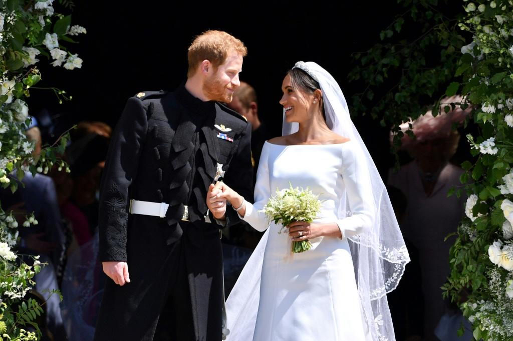 Surprise! Harry and Meghan were already married during ...