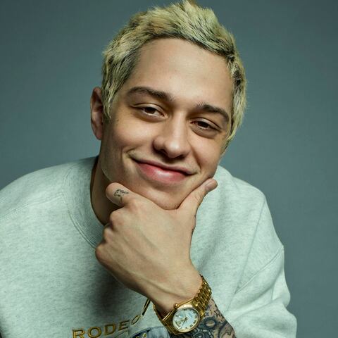 Pete Davidson all smiles after a night spent in hotel with Kim