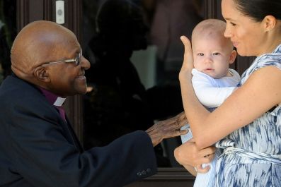 Desmond Tutu with Archie and Meghan Markle