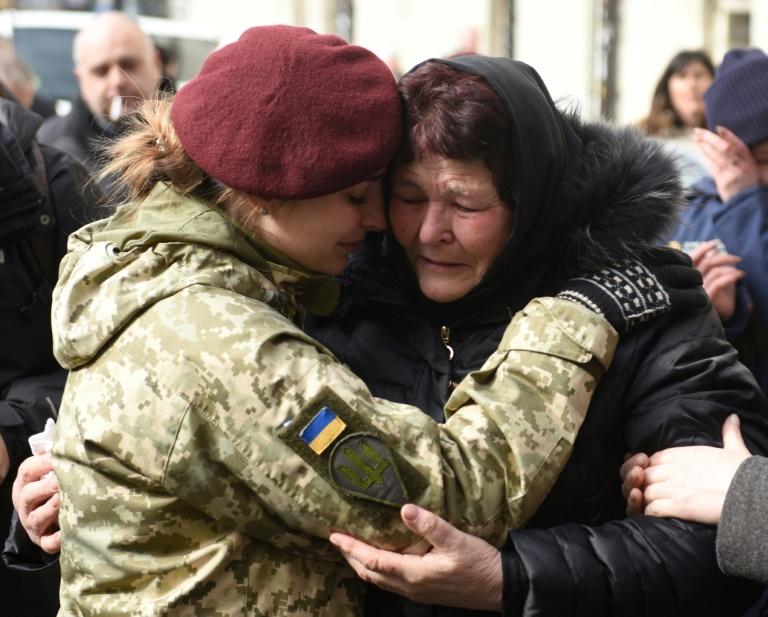 'We will win': Ukraine families mourn their fallen soldiers | IBTimes UK