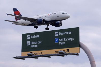 A Delta Airlines commercial aircraft approaches to land at John Wayne Airport in Santa Ana, California