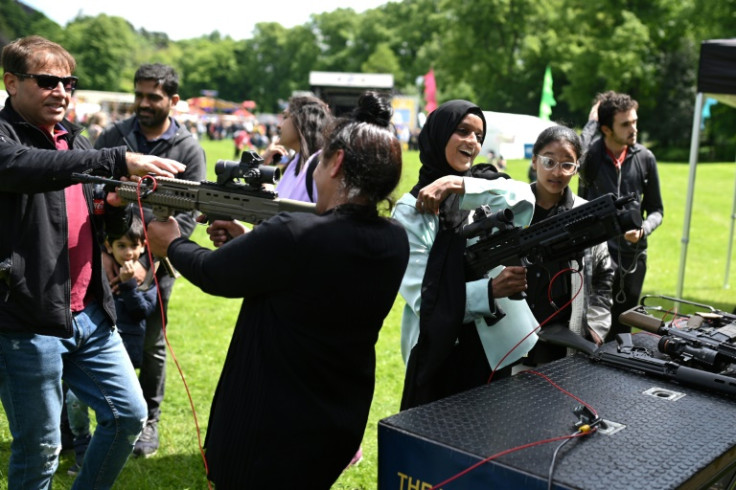 Le festival Preston City Mela dédié aux arts et à la culture d'Asie du Sud fête ses 25 ans et le jubilé de platine de la reine Elizabeth II, à Preston, dans le nord de l'Angleterre, le 4 juin 2022