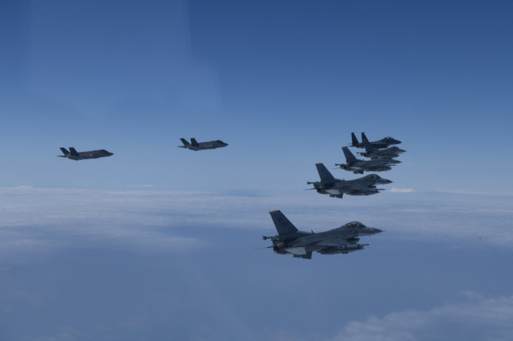 Jet fighters from U.S. and South Korea air forces conduct a formation flight during their military exercise