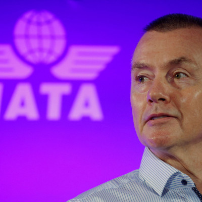 Willie Walsh, Director General of the International Air Transport Association, takes part in a panel discussion