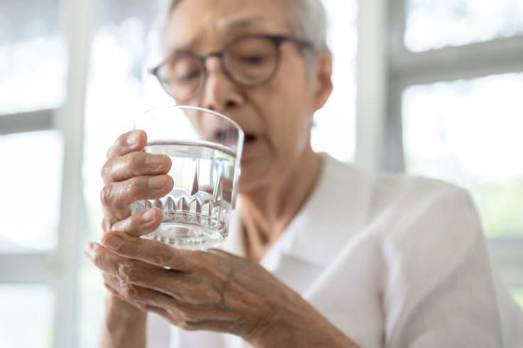 Symptoms of Parkinson’s include tremors, stiffness and slowness of movement.