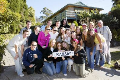 Fans pose in front of the set of the Australia's popular television show Neighbours in Melbourne.