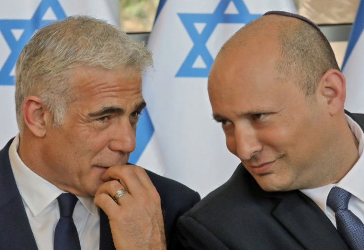 Under the deal Bennett (right) struck with the coalition's architect, Foreign Minister Yair Lapid (left), the two are meant to trade posts