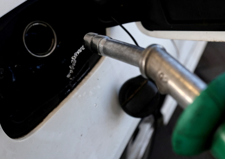Car is filled with petrol at a filling station