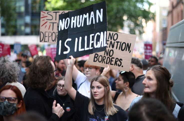 Protestors demonstrate outside the Home Office building against the British Governments plans to deport asylum seekers to Rwanda