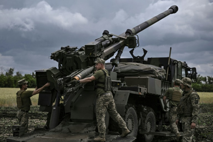 At a secret frontline location in eastern Ukraine, soldiers from the 55th brigade artillery unit fired off three rounds from a Caesar howitzer