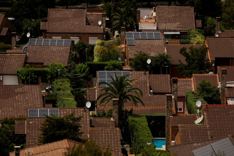 Solar panels are seen on the roofs of homes at the well-to-do suburb of Rivas-Vaciamadrid, south of Madrid