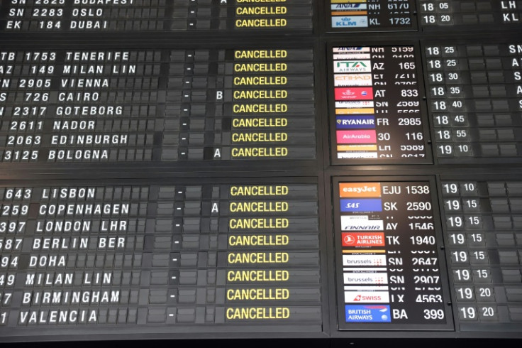 A flight information board shows cancelled flights due to a strike of security guards on June 20, 2022 at Brussels's international Airport
