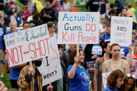 People participate in the 'March for Our Lives' rally against gun violence