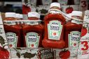Bottles of Heinz Tomato Ketchup, owned by the Kraft Heinz Company, are seen for sale in Queens, New York