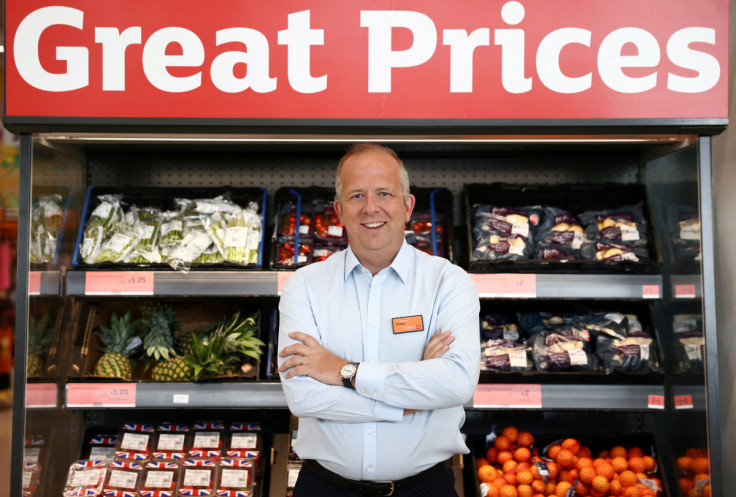 Chief Executive Officer of Sainsbury's Simon Roberts poses inside a Sainsbury’s  supermarket in Richmond, west London