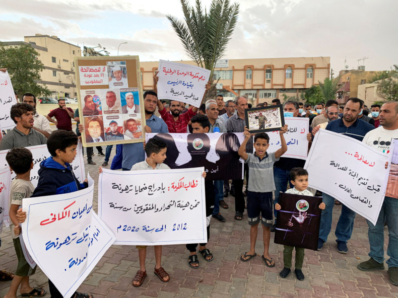 Families of the victims gather during a protest demanding justice for the missing people and mass graves, in Tarhouna