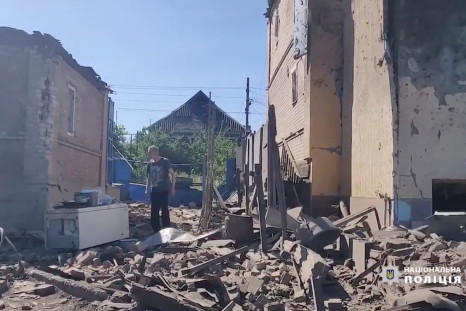 A man walks in the rubble near damaged buildings, as Russia's invasion of Ukraine continues, in Bakhmut