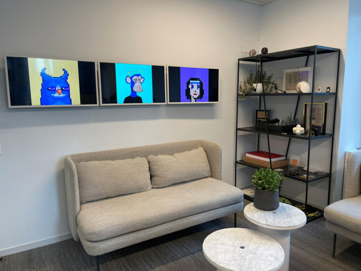 Crypto trading firm GSR's corporate NFT collection is seen on digital displays in the company's office, in New York