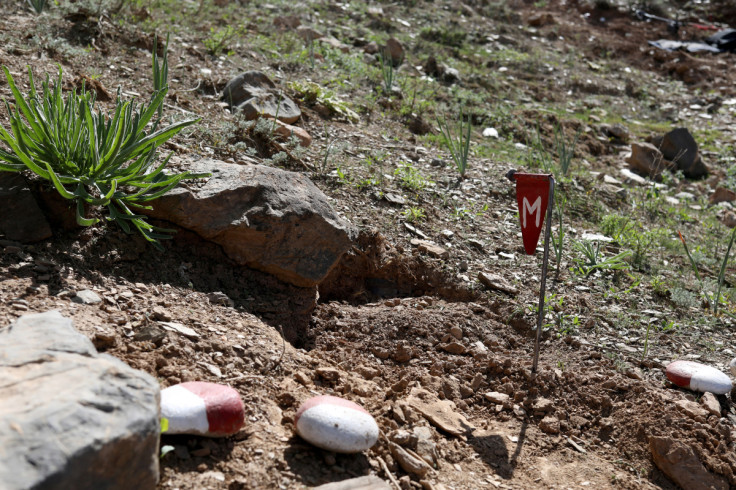 A landmine discovered by members of a demining organisation is seen in Khaki Jabbar district of Kabul province