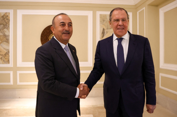 Russian Foreign Minister Sergei Lavrov and Turkish Foreign Minister Mevlut Cavusoglu meet in Denpasar