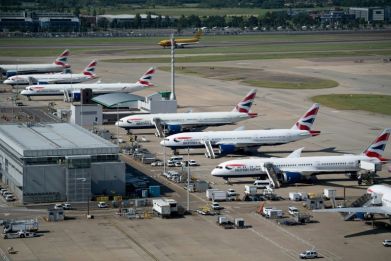 British Airways planes are seen here at Heathrow Airport -- a strike called for the summer there by BA staff has been called off after an improved pay offer
