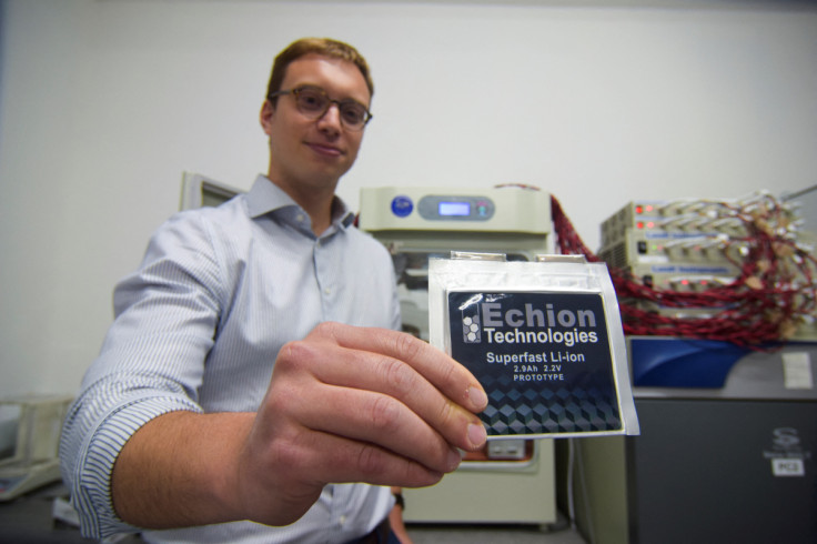 Echion Technologies CEO Jean de La Verpilliere holds up a commercial format prototype battery at the battery startup’s headquarters in Cambridge