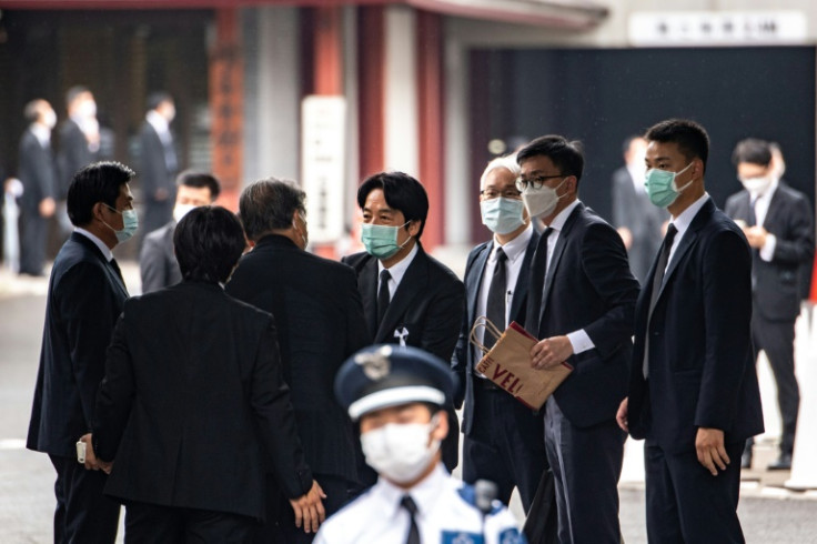 Taiwanese vice president William Lai Ching-te (C) greets officials