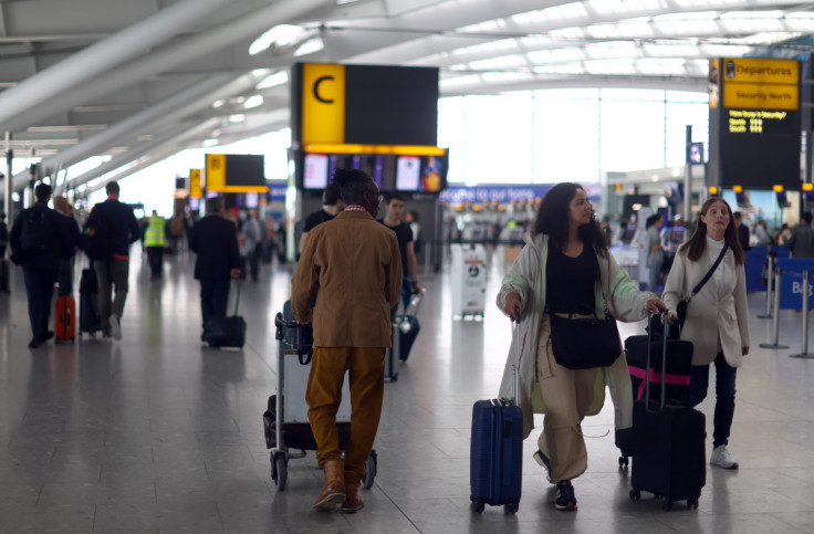 Passengers wait at Heathrow Terminal 5 airport