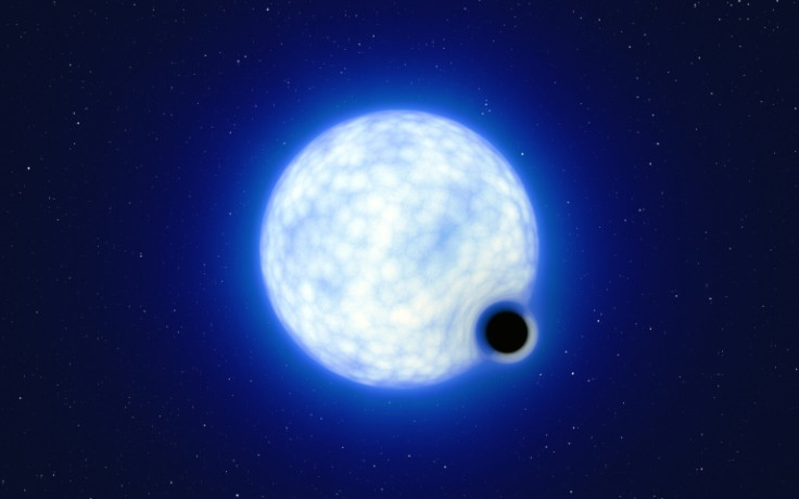 An artist's impression of the 'dormant' black hole, quietly orbiting its companion star