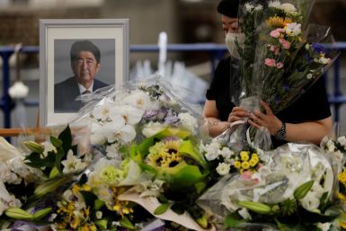 Mourners gather at the altar for the late former Japanese Prime Minister Shinzo Abe, in Tokyo