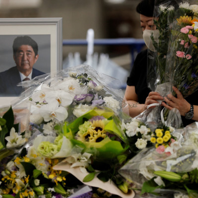 Mourners gather at the altar for the late former Japanese Prime Minister Shinzo Abe, in Tokyo