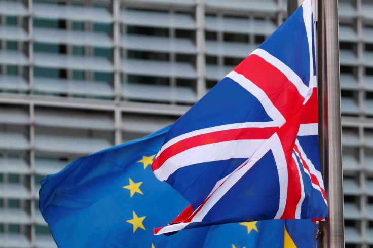 Union Jack and the EU flags fly at EC headquarters in Brussels