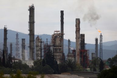 Excess natural gas is burnt, or flared, from Mexican state-owned Pemex's Tula oil refinery, located adjacent to the Tula power plant belonging to national power company Comision Federal de Electricidad, or CFE, in Tula de Allende