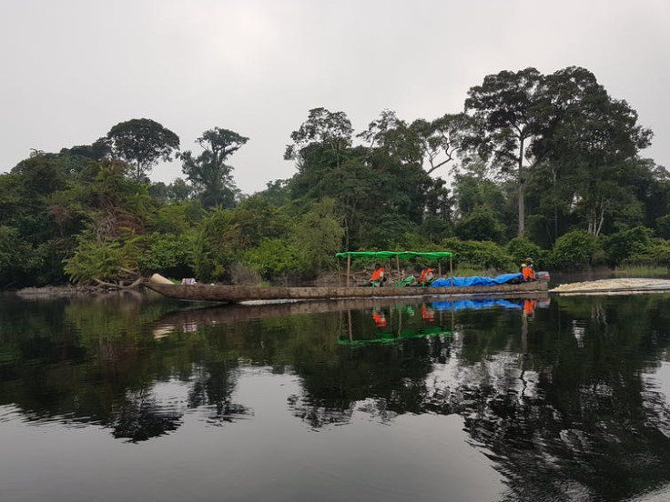  The research team traversing the Ruki river by canoe.