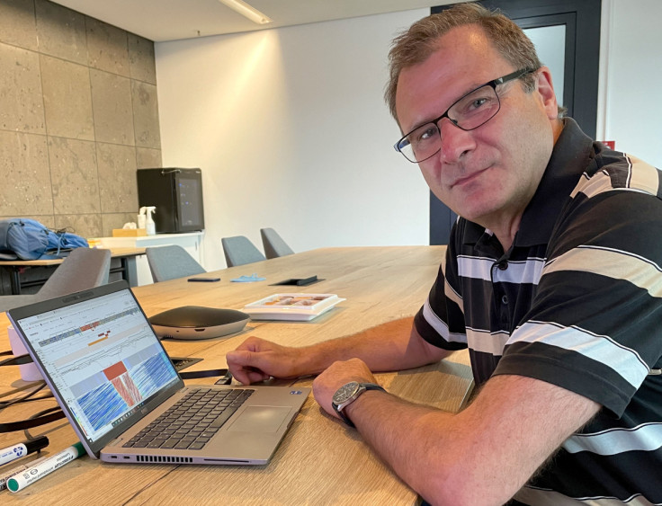 TomTom traffic specialist Ralf-Peter Schaefer poses in company's office in Berlin