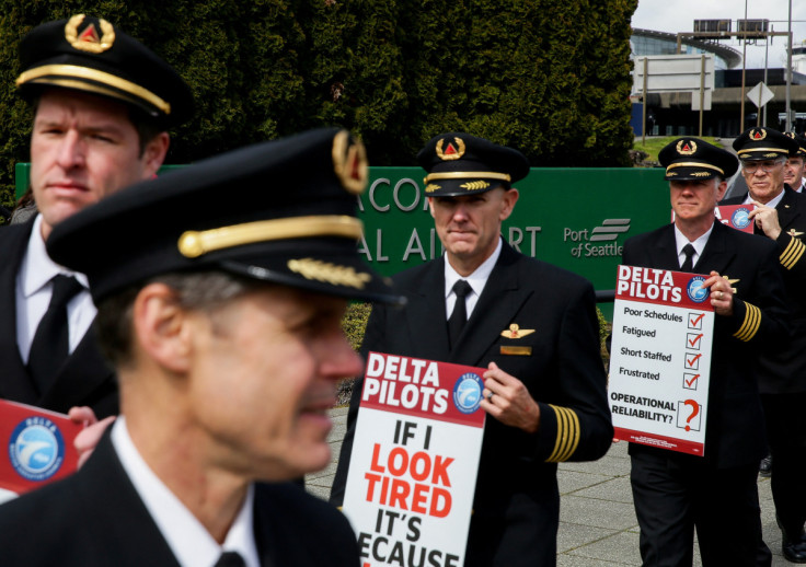 Off-duty Delta Air Lines pilots picket outside Seattle-Tacoma International Airport in Seattle