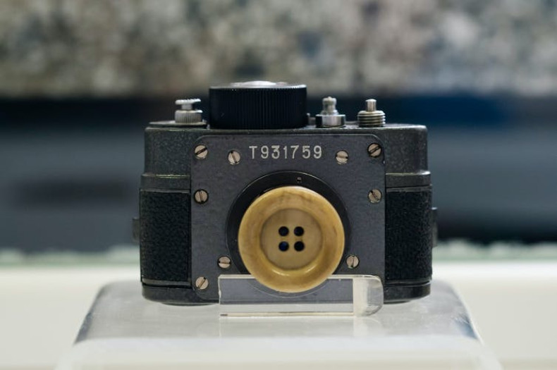  Button spy camera on display at offices of East German secret Police (STASI) Museum in Berlin, Germany.
