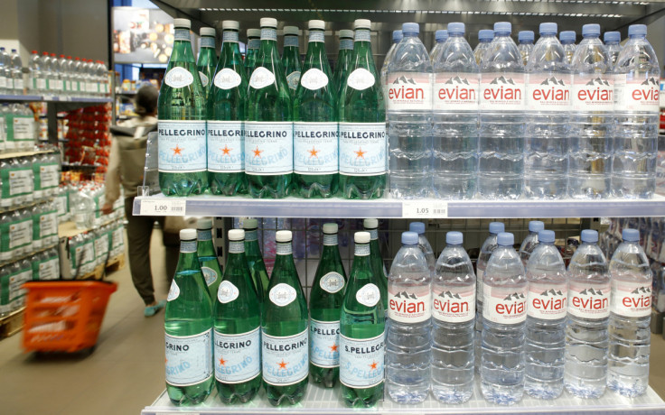 Bottles of San Pellegrino and Evian mineral water are displayed at a supermarket of Swiss retail group Migros in Zurich