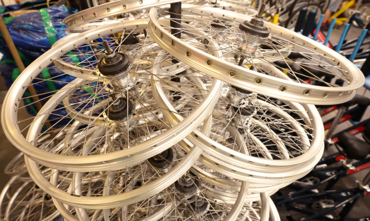 Bike wheels are stacked at the Pashley bicycle factory in Stratford-upon-Avon