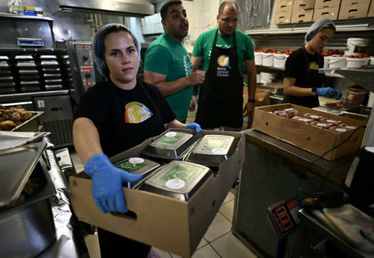 Volunteers of "World Food Kitchen" organisation prepare meals