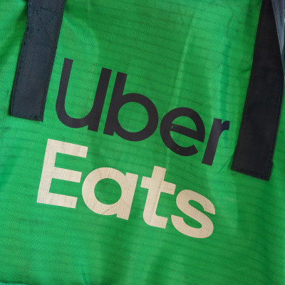 An Uber Eats delivery bag is seen on a bicycle in Brooklyn, New York City