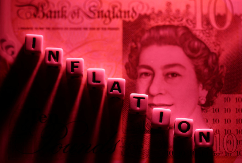 Illustration shows plastic letters arranged to read "Inflation" are placed on British Pound banknote