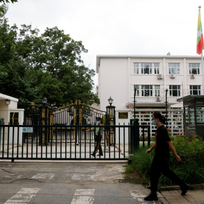 Man walks past the Myanmar embassy in Beijing